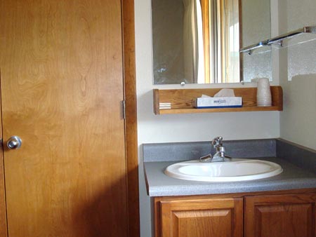 Sink and bathroom door in Twin Sisters
