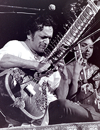 Ravi Shankar plays the sitar